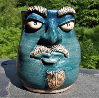 Teal Face Mug with Mustache