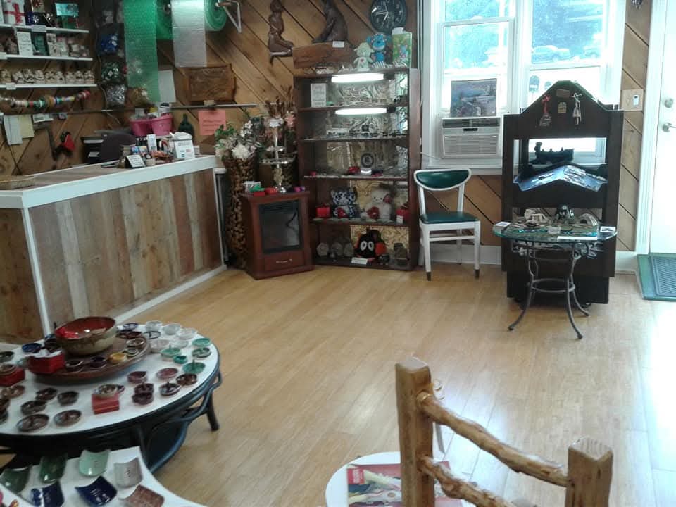 Inside my former gift shop including a custom built check out counter.